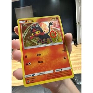 Litten SM23‎ INSANE FART SWIRL PLACEMENT🌀 Pokemon promo Damaged